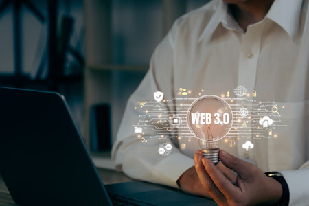 Businessman holding light bulb with icon Web 3.0. Technology and WEB 3.0 concept.の写真素材