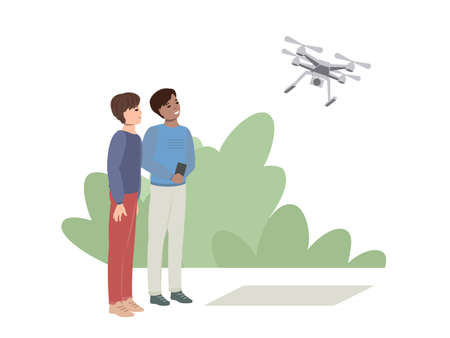 Two teenagers launch a drone quadcopter into the sky. Classes in a technical club, training and...