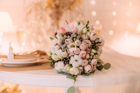 Beautiful bouquet bride in winter style. Unusual floral arrangement, pastel colors. Universal decor, festive mood.の写真素材