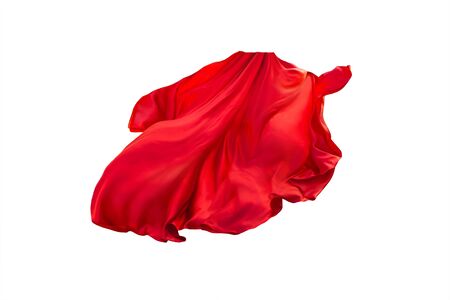 floating elegance glamour silk skirt long train. Beautiful flowing fabric flying wind. Red wavy satin. Abstract element cloth design. Image isolated white background. natural soft lightの写真素材