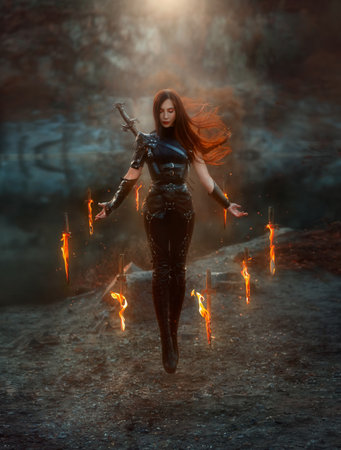 Fantasy fighting woman assassin in levitation soars in air with burning daggers. Red-haired girl warrior in black leather costume. ninja soldier with knives, fire magic. Hair fluttering fly in windの写真素材