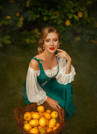 art photo real person Happy village fantasy woman harvesting orange lemons in garden trees leaves fog, basket with yellow fresh fruits. Girl smiling face. vintage old style green dress white blouseの写真素材