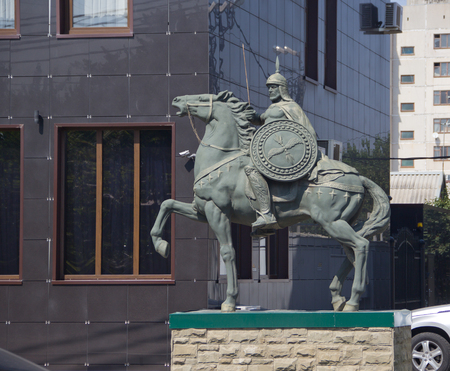 KRASNODAR, RUSSIA- AUGUST 23, 2016: The sculpture "Warrior on a horse" next to the hotel "Berlin house"のeditorial素材