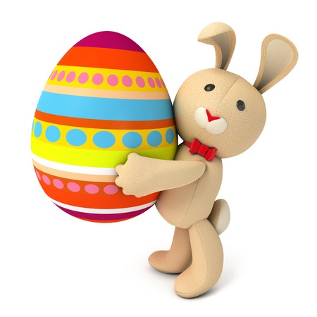 Cute funny toy bunny holding in the paws of a large Easter egg. Isolated on white background. 3d renderの写真素材