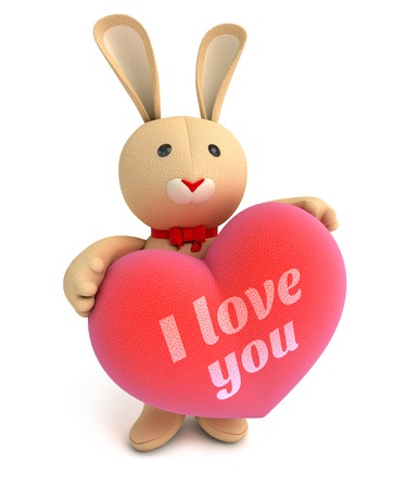 Toy teddy bunny holding a big heart with the words I love you. Congratulation to wedding or Valentine's Day. Isolated on white background. 3d renderの写真素材