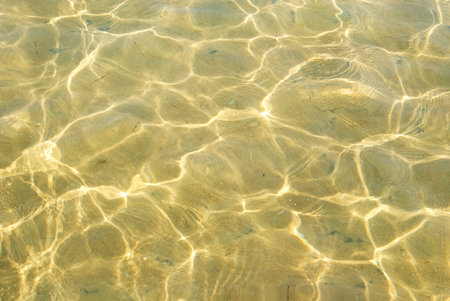 Light Dancing On The Sea. Sun reflection background. Ripple waterの写真素材
