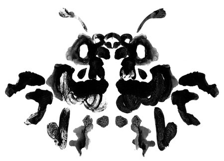 Mirror symmetrical black spots. Drops of paintの写真素材