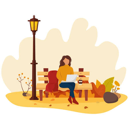 A girl sits on a bench in an autumn park and works at a laptop. Trend colors. Vector illustration in cartoon flat style.のイラスト素材