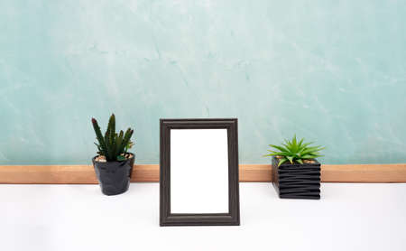 Closeup of square empty wooden picture. Home design. Art concept. Front view. Scandinavian interior. copy space.の写真素材