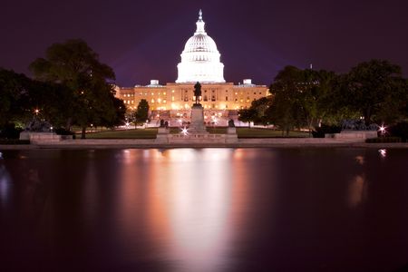 US Capitol Building With Reflection In Reflecting Pool At Nightの写真素材