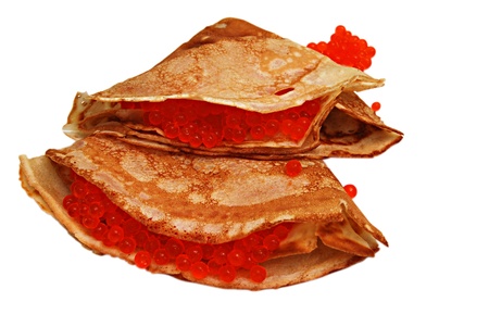 thin pancakes with red caviar the isolatedの写真素材