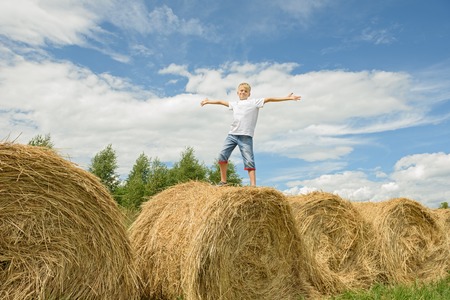 Happy childhood. A summer sunny day in the village.の写真素材