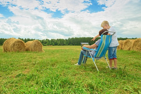 Happy childhood. A summer sunny day in the village.の写真素材