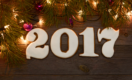 New year , Christmas gingerbreads wooden backgroundの写真素材