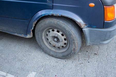 Rusty car's wheel and bod. Severe Rust and corrosionの写真素材