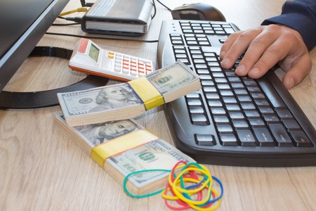 Make money from home everyday. Business proposal pictures. Online business can make more money, The dollar around youの写真素材