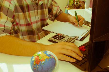 Businesspersons analyzing report, business performance concept. Corporate businessman working at...