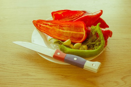 Fresh organic vegetables on table. Include fresh organic vegetables and pepper on wooden floor. Green and red bell pepper backgro - Retro colorの写真素材