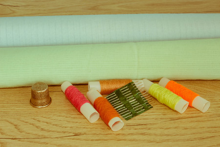 instruments sewing craft on wooden background close up. tools for sewing for hobby