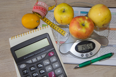 Concept diet. Lose weight by eating healthy fruit. Fruit dietingの写真素材