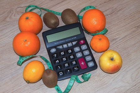 Concept diet. Lose weight by eating healthy fruit. Fruit dietingの写真素材