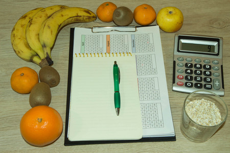 Concept diet. Lose weight by eating healthy fruit. Fruit dietingの写真素材