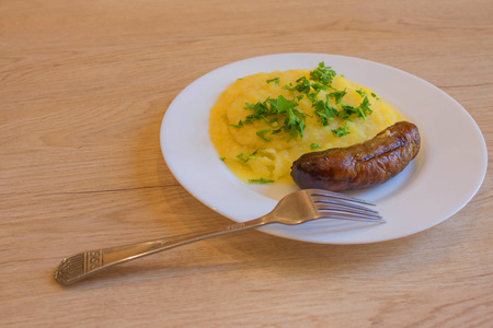 Homemade Bangers and Mash with Herbs and Gravy. fast food and unhealthy eating conceptの写真素材
