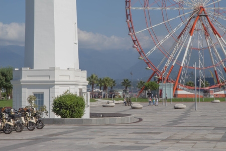 Park and lake in the city Batumi center on a sunny spring dayの写真素材