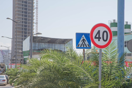 Highway, road traffic with cars and trucks. The long road ahead. Road sign informingの写真素材