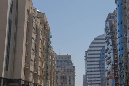 Modern apartment buildings exteriors in sunny day. Skyscraper in Downtown city Batumi