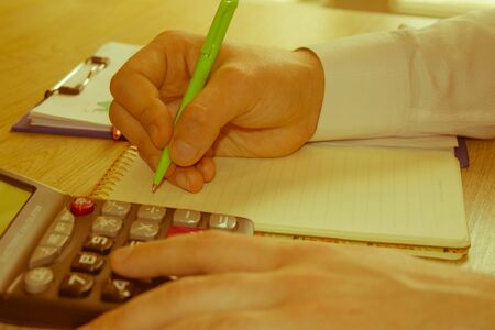 Real estate agent working at the table. business financial accounting concept
