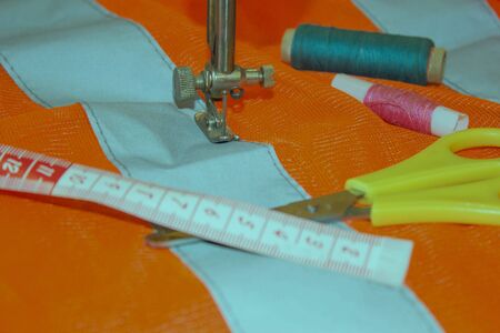 Sewing tools and sewing kit. Sewing kit. Thread, needles and cloth