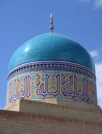 Beautiful mosque tomb in Uzbekistan in sunlight with blue skyのeditorial素材