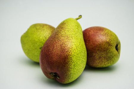Three pears isolated on white backgroundの写真素材