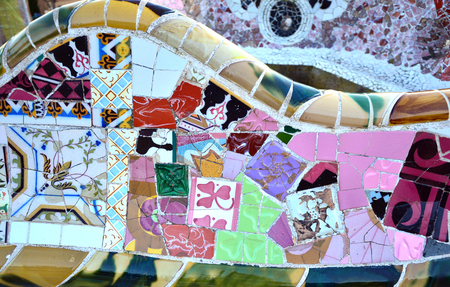 Mosaic detail of a ceramic tiled bench in Park Guell, Barcelona, Spainの写真素材