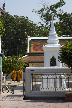 2 monks entering templeの写真素材