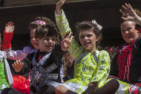 SYDNEY, AUSTRALIA - Mar 17TH  Children waving during the  St Patrickのeditorial素材