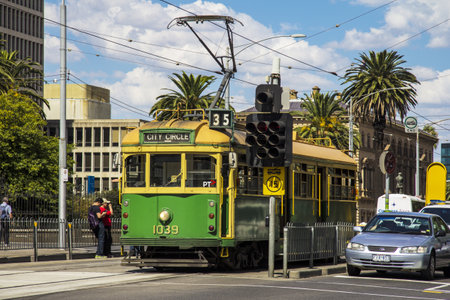 MELBOURNE, AUSTRALIA - MAR 20TH  A city circle tram waits at a stop light on March 20th 2013  The tram line is a free service that runs through the Central Business District のeditorial素材