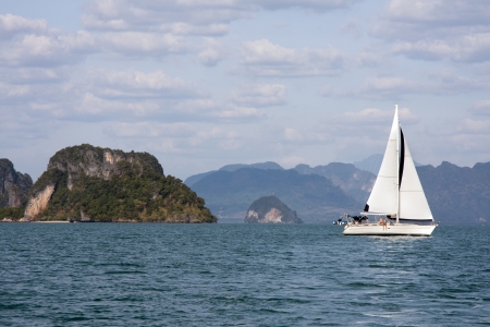 Yacht sailing in Phang Nga Bay, Phuket Thailandの写真素材