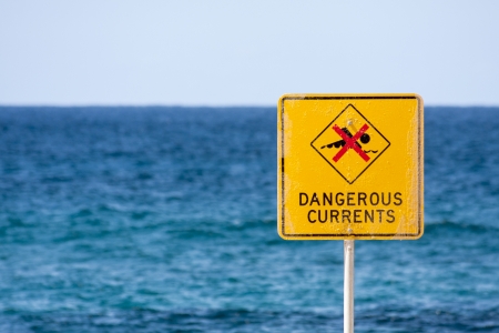 Dangerous currents sign on Bronte beach, Sydney, New South Wales, Australiaの写真素材