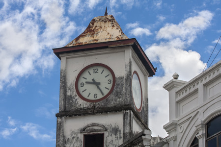 The old police station clock tower in Phuket town (horizontal)の写真素材