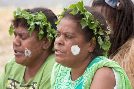 Kuto, Iles des Pins-January 8th 2014: Kanak female singers during a song and dance performance. Melanesian Kanak are the main inhabitants of Kuto.のeditorial素材