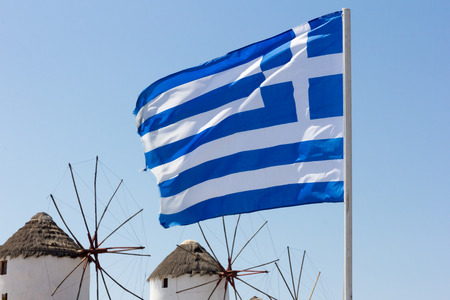 Greek flag and windmills, Myonos, Greeceの写真素材