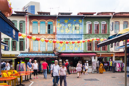 Singapore - 4th April 2017: Tourists strolling around Pagoda street. Chinatown is a magnet for tourists.のeditorial素材