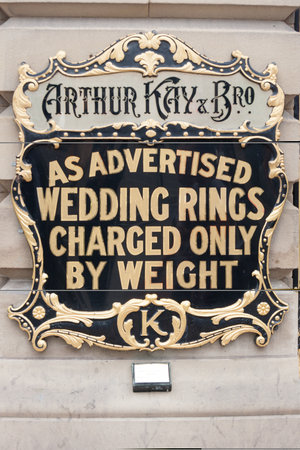 Manchester, England - August 18th 2011: Sign for Arthur Kay and brother jewellery shop selling wedding rings by weight. They are an old established firm.のeditorial素材