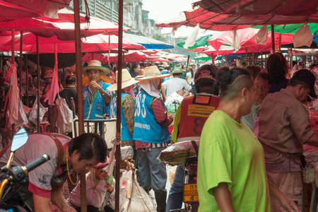 Bangkok, Thailand - March 20th 2015: people and porters, Khlong Toei wet market. This is the largest wet market in the city.のeditorial素材