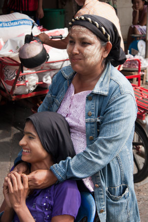 Mae Sot, Thailand - November 20th 2011: Two Burmese women. Many Burmese cross the border into the town.のeditorial素材