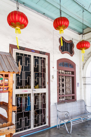 Phuket, Thailand - August 17th 2013: Typical shop house in old Phuket Town, The architecture is typical sino portuguese style.のeditorial素材