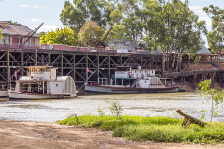 Echuca, Australia - 23rd February 2018: Paddle steamers Adelaide and Pevensey moored on Murray river. Boat trips are a popular pastimeのeditorial素材