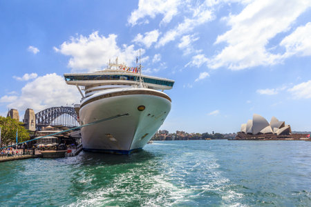 Sydney, Australia - January 4th2014: The cruise ship Diamond Princess moored in the harbour. The Central Business District is behind.のeditorial素材